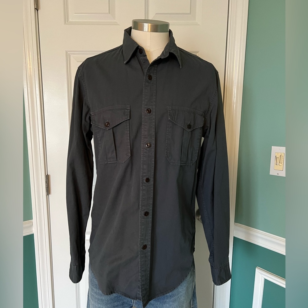 Military style  100% cotton button down with flap pockets.